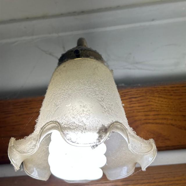 Light fixture before cleaning